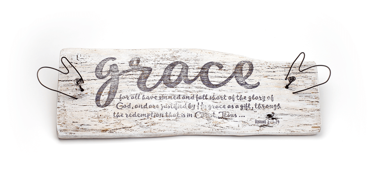 salvaged wood sculpture with the word "Grace" and a Bible verse imprinted on it